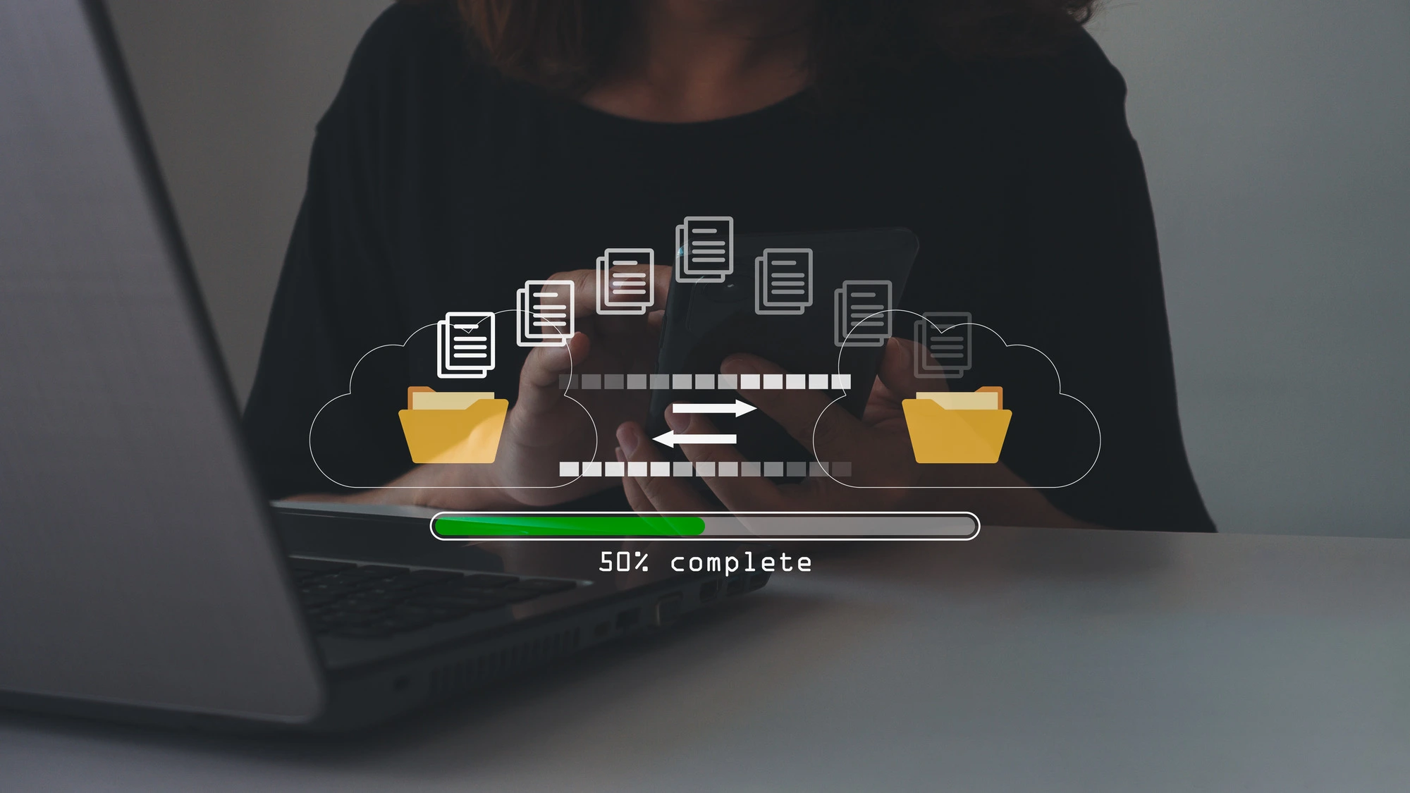 A person sharing a file from a laptop